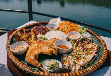 Phongnha Discovery Tours What to Eat in Phong Nha: Grilled Chicken, Cháo Canh, Son River Carp & Quảng Hòa Pancakes