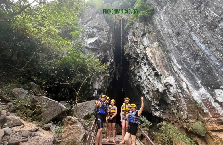 Travelers starting a cave exploration with Phongnha Discovery Tours in Phong Nha